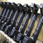 
              KelTec 9mm SUB2000 rifles, similar to ones being shipped to Ukraine, are viewed in a testing room at a manufacturing facility on Thursday, March 17, 2022, in Cocoa, Fla. The family-owned gun company was left holding a $200,000 shipment of semi-automatic rifles after a longtime customer in Odessa suddenly went silent during Vladimir Putin’s invasion of Ukraine. Fearing the worst, the company decided to put those stranded 400 guns to good use, sending them to Ukraine's nascent resistance movement. (AP Photo/Phelan M. Ebenhack)
            