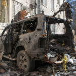 
              A car destroyed by shelling is seen in a street in Kharkiv, Ukraine, Tuesday, March 22, 2022. (AP Photo/Andrew Marienko)
            