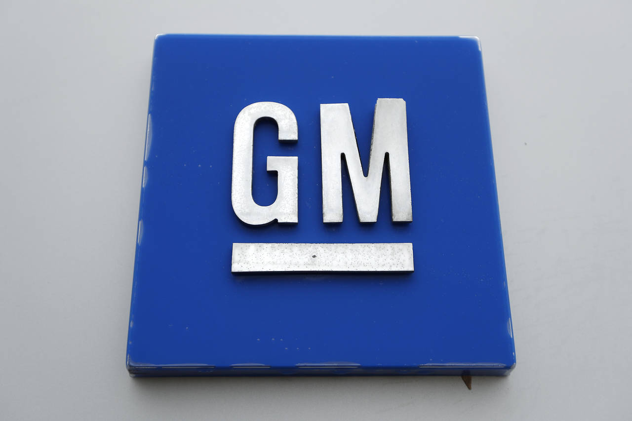 This Jan. 27, 2020 photo shows the General Motors logo.  General Motors is shutting down its pickup...