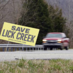 
              A sign posted by opponents to a wastewater treatment plant stands near a highway on March 8, 2022, in Primm Springs, Tenn. The Water Authority of nearby Dickson County has plans for a new water treatment plant that will use Lick Creek as a wastewater outflow for the plant. Residents of neighboring Hickman County worry that the new plant will destroy their pristine creek's aquatic life; contaminate wells, springs and crops; and increase flooding. The plant would discharge up to 12 million gallons per day into Lick Creek, which has a low flow of less than 9 million gallons per day. (AP Photo/Mark Humphrey)
            