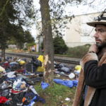 
              Nathan Rose remembers hearing the vehicle crash into the camp he's staying at, killing several people near Front Street Northeast, Sunday, March 27, 2022, in Salem, Ore. (Abigail Dollins/Statesman-Journal via AP)
            