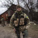 
              A soldier smokes a cigarette near the frontline in Brovary, on the outskirts of Kyiv, Ukraine, Monday, March 28, 2022. (AP Photo/Rodrigo Abd)
            
