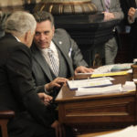 
              In this photo from Wednesday, March 23, 2022, Kansas Senate President Ty Masterson, right, R-Andover, confers with Majority Leader Larry Alley, R-Winfield, during a session at the Statehouse in Topeka, Kan. Masterson said conservatives have been unable to garner veto-proof majorities on some measures because of a few "legacy" Republicans. (AP Photo/John Hanna)
            