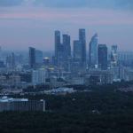 
              FILE - The Moscow City skyscrapers are seen during a sunset in Moscow, Russia, on July 15, 2018. Russian technology workers are fleeing the country by the tens of thousands as the economy goes into a tailspin under pressure from international sanctions. For some countries, Russia’s loss is being seen as their potential gain and an opportunity to bring fresh expertise to their own high-tech industries. (AP Photo/Alexander Zemlianichenko, File)
            