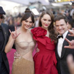 
              Troy Kotsur, from left, Emilia Jones, Amy Forsyth and Daniel Durant arrive at the Oscars on Sunday, March 27, 2022, at the Dolby Theatre in Los Angeles. (AP Photo/John Locher)
            