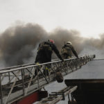 
              Firefighters work to extinguish a fire after shelling in Kharkiv, Ukraine, Wednesday, April 13, 2022. (AP Photo/Andrew Marienko)
            