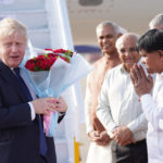 
              British Prime Minister Boris Johnson arrives at the Sarda Vallabhbhai Patel International airport in Ahmedabad, in the state of Gujarat, India, Thursday, April 21, 2022, as he begins a two day visit to the country. (Stefan Rousseau/Pool Photo via AP)
            