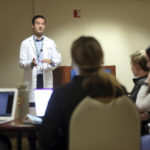
              Dr. Keith Reisinger-Kindle, associate director of the OB-GYN residency program at Wright State University's medical school in Dayton, Ohio, leads a lecture of OB-GYN residents in the Wright State program Wednesday, April 13, 2022. The physician created and implemented abortion coursework for medical students and residents, with support from his university, and offers training at a nearby clinic where he also performs abortions. (AP Photo/Paul Vernon)
            