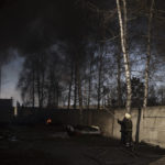 
              Firefighters extinguish a fire at a factory after a Russian attack in the outskirts of Kharkiv, Ukraine, Friday, April 15, 2022. (AP Photo/Felipe Dana)
            