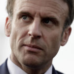 
              Current French President and centrist presidential candidate for reelection Emmanuel Macron meets workers as he visits a building site for Log's company in Denain, northern France, Monday, April 11, 2022 . French President Emmanuel Macron declared Monday that he wants to "convince" a broad range of French voters to back his centrist vision, kicking off a two-week battle against far-right challenger Marine Le Pen ahead of the country's presidential runoff vote. (AP Photo/Lewis Joly, Pool)
            