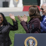 
              President Joe Biden and Vice President Kamala Harris applaud Judge Ketanji Brown Jackson as Harris speaks during an event on the South Lawn of the White House in Washington, Friday, April 8, 2022, celebrating the confirmation of Jackson as the first Black woman to reach the Supreme Court. (AP Photo/Andrew Harnik)
            