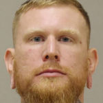 
              FILE- In a photo provided by the Kent County Sheriff, Brandon Caserta is shown in a booking photo.  Two of four men were acquitted Friday, April 8, 2022 of conspiracy to kidnap Michigan Gov. Gretchen Whitmer in 2020, motivated by fury at the Democrat’s tough COVID-19 restrictions early in the pandemic.   The jury’s verdicts against Daniel Harris and Brandon Caserta were read in the federal court in Grand Rapids, Michigan, in the case presided over by U.S. District Judge Robert Jonker. Jurors said they couldn’t agree on verdicts against Adam Fox and Barry Croft Jr.  (Kent County Sheriff via AP, File)
            