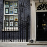 
              A police officer guards the entrance to 10 Downing Street, in London, Wednesday, April 13, 2022. Britain's Prime Minister Boris Johnson was fined for breaching COVID-19 regulations following allegations of lockdown parties at government offices. Treasury Chief Rishi Sunak was also fined.(AP Photo/Frank Augstein)
            