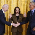 
              Vice President Kamala Harris reacts as President Joe Biden shakes hands with former President Barack Obama after Obama jokingly called Biden vice president in the East Room of the White House in Washington, Tuesday, April 5, 2022. (AP Photo/Carolyn Kaster)
            