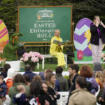 
              Actress Kristin Chenoweth reads to children during the White House Easter Egg Roll, Monday, April 18, 2022, at The White House in Washington. (AP Photo/Andrew Harnik)
            