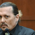 
              Actor Johnny Depp testifies during a hearing at the Fairfax County Circuit Court in Fairfax, Va., Tuesday April 19, 2022. Actor Johnny Depp sued his ex-wife Heard for libel in Fairfax County Circuit Court after she wrote an op-ed piece in The Washington Post in 2018 referring to herself as a "public figure representing domestic abuse." (Jim Watson/Pool Photo via AP)
            
