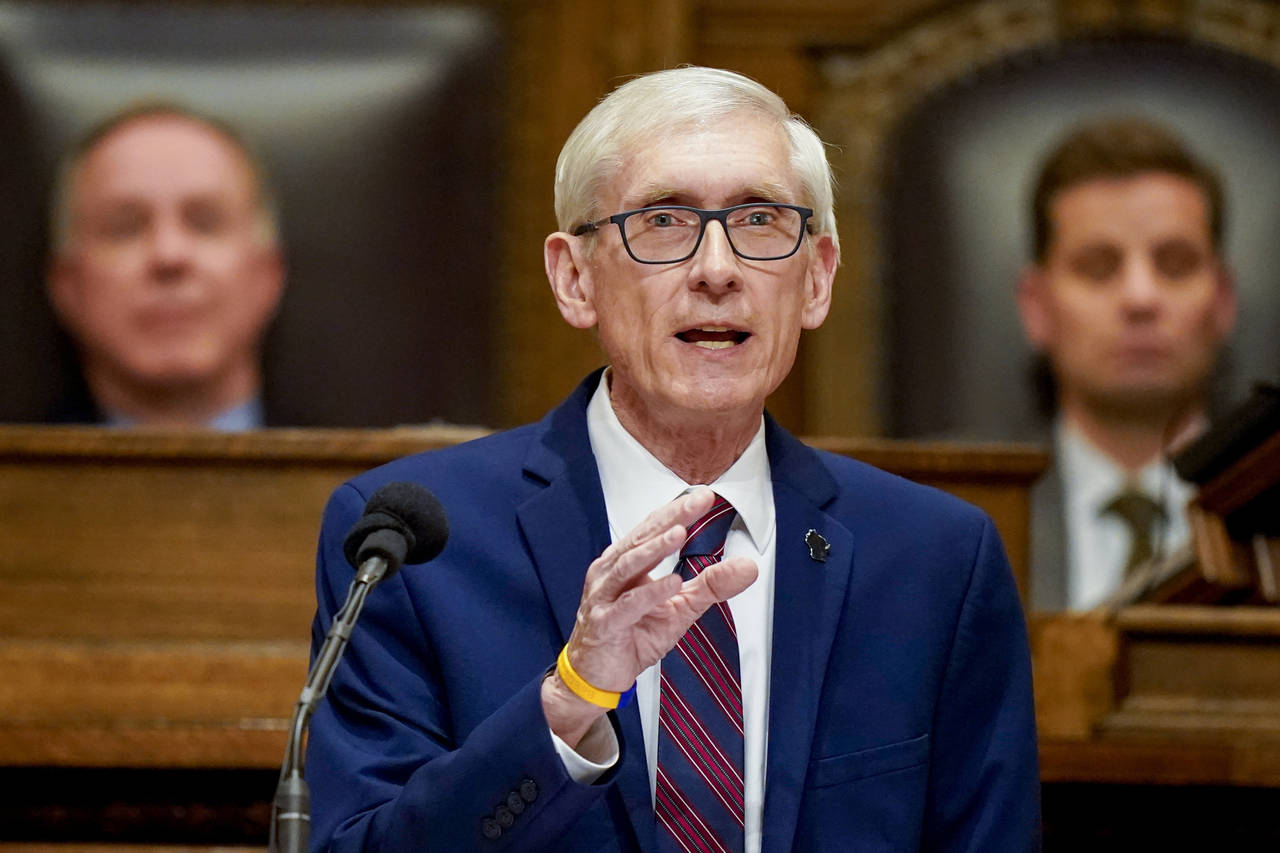 FILE - Wisconsin Gov. Tony Evers addresses a joint session of the Legislature in the Assembly chamb...