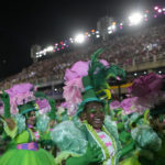 
              Performers from the Mangueira samba school parade during Carnival celebrations at the Sambadrome in Rio de Janeiro, Brazil, Friday, April 22, 2022. (AP Photo/Silvia Izquierdo)
            