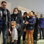 
              People queue to vote in general election in Budapest, Hungary, Sunday, April 3, 2022. Hungary's nationalist prime minister Viktor Orban seeks a fourth straight term in office, a coalition of opposition parties are framing the election as a referendum on Hungary's future in the West. (AP Photo/Petr David Josek)
            