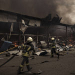 
              Firefighters work to extinguish a fire on a warehouse amid Russian bombardments in Kharkiv, Ukraine, Saturday, April 23, 2022. (AP Photo/Felipe Dana)
            