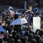 
              Current French President and centrist presidential candidate for reelection Emmanuel Macron delivers a speech during a campaign rally, in Strasbourg, eastern France, Tuesday, April 12, 2022 . Macron, with strong pro-European views, and far-right candidate Marine Le Pen, an anti-immigration nationalist, are facing each other in the presidential runoff on April 24. (AP Photo/Jean-Francois Badias)
            