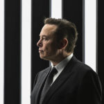 
              FILE - Elon Musk, Tesla CEO, attends the opening of the Tesla factory Berlin Brandenburg in Gruenheide, Germany, March 22, 2022.  Twitter said in a statement Friday, April 15, 2022,  that its board of directors has unanimously adopted a “poison pill” defense in response to Tesla CEO Elon Musk’s proposal to buy the company and take it private.   (Patrick Pleul/Pool Photo via AP, File)
            