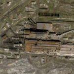 
              This satellite photo released by Planet Labs and taken on April 20, 2022 shows the Azovstal Steel Plant in Mariupol, Ukraine, with some large holes blasted in the roof. (Planet Labs via AP)
            