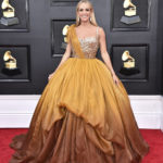 
              Carrie Underwood arrives at the 64th Annual Grammy Awards at the MGM Grand Garden Arena on Sunday, April 3, 2022, in Las Vegas. (Photo by Jordan Strauss/Invision/AP)
            