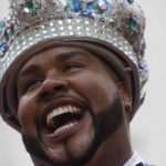 
              Carnival King Momo, Wilson Dias da Costa Neto, smiles during the ceremony marking the official start of Carnival in Rio de Janeiro, Brazil, Wednesday, April 20, 2022. (AP Photo/Bruna Prado)
            