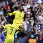 
              Chelsea's Ruben Loftus-Cheek, right, celebrates after scoring the opening goal during the English FA Cup semifinal soccer match between Chelsea and Crystal Palace at Wembley stadium in London, Sunday, April 17, 2022. (AP Photo/Ian Walton)
            