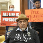 
              Leno Rose-Avila, a supporter of death row inmate Melissa Lucio, waits in the Governor's Public Reception Room at the Capitol, in Austin, Texas, on Monday April 25, 2022, for a decision from the Board of Pardons and Paroles about her clemency. ( Jay Janner/Austin American-Statesman via AP)
            