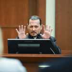 
              Actor Johnny Depp testifies during a hearing at the Fairfax County Circuit Court in Fairfax, Va., Tuesday April 19, 2022. Actor Johnny Depp sued his ex-wife Heard for libel in Fairfax County Circuit Court after she wrote an op-ed piece in The Washington Post in 2018 referring to herself as a "public figure representing domestic abuse." (Jim Watson/Pool Photo via AP)
            