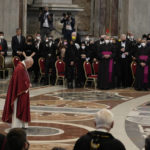 
              Pope Francis arrives to celebrate the 'In passione Domini' (in the passion of the Lord) mass in St. Peter's Basilica at the Vatican on Good Friday, Friday, April 15, 2022. (AP Photo/Andrew Medichini)
            