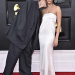 
              Justin Bieber, left, and Hailey Bieber arrive at the 64th Annual Grammy Awards at the MGM Grand Garden Arena on Sunday, April 3, 2022, in Las Vegas. (Photo by Jordan Strauss/Invision/AP)
            