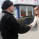 
              Former Alaska Gov. Sarah Palin, right, greets volunteer Billy Fuller, left, at the opening of her new campaign headquarters in Anchorage, Alaska, on Wednesday, April 20, 2022. Palin, the first Republican female vice presidential nominee, is among 48 candidates running for the Alaska's lone seat in the U.S. House following the death last month of Republican Rep. Don Young, who held the job for 49 years. (AP Photo/Mark Thiessen)
            