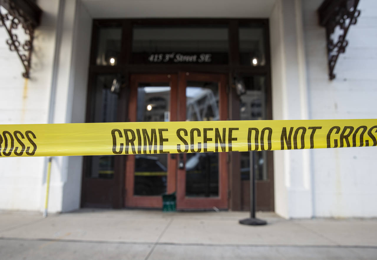 Crime scene tape blocks off the Taboo Nightclub and Lounge in Cedar Rapids, Iowa on Sunday, April 1...