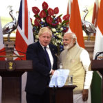 
              Indian Prime Minister Narendra Modi shakes hand with his British counterpart Boris Johnson after signing of memorandums and making press statements, in New Delhi, Friday, April 22, 2022. India and Britain on Friday called on Russia for an immediate ceasefire in Ukraine as British Prime Minister Boris Johnson announced steps to help move New Delhi away from its dependence on Russia by expanding economic and defense ties. (AP Photo/Manish Swarup)
            