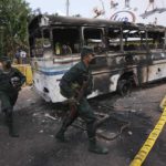 
              Sri Lankan army soldiers arrive at the vandalised neighbourhood of Sri Lankan President Gotabaya Rajapksa's private residence after overnight clashes in Colombo, Sri Lanka, Friday, April 1, 2022. Dozens of people were arrested in Sri Lanka following protests near the president's home demanding that he resign amid the country's worst economic crisis in memory, police said Friday. (AP Photo/Eranga Jayawardena)
            