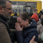
              A woman from Mariupol cries as she arrives at a refugee center fleeing from the Russian attacks, in Zaporizhzhia, Ukraine, Thursday, April 21, 2022. Mariupol, which is part of the industrial region in eastern Ukraine known as the Donbas, has been a key Russian objective since the Feb. 24 invasion began. (AP Photo/Leo Correa)
            