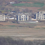 
              North Korea's Kaepoong town is seen from the unification observatory in Paju, South Korea, Friday, April 15, 2022. North Korea is marking a key state anniversary Friday with calls for stronger loyalty to leader Kim Jong Un, but there was no word on an expected military parade to display new weapons amid heightened animosities with the United States. (AP Photo/Lee Jin-man)
            