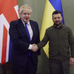 
              In this image provided by the Ukrainian Presidential Press Office, Ukrainian President Volodymyr Zelenskyy, right, and Britain's Prime Minister Boris Johnson shake hands during their meeting in Kyiv, Ukraine, Saturday, April 9, 2022. Boris Johnson has traveled to Ukraine to meet with President Volodymyr Zelenskyy in show of solidarity. The two leaders meeting Saturday discussed the “U.K.’s long term support to Ukraine’’ including a new package of financial and military aid, the prime minister’s office said.  (Ukrainian Presidential Press Office via AP)
            
