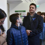 
              Opposition leader Peter Marki-Zay and members of his family wait to vote in general election in Hodmezovasarhely, southern Hungary, Sunday, April 3, 2022. Hungary's nationalist prime minister, Viktor Orban, seeks a fourth straight term in office, a coalition of opposition parties are framing the election as a referendum on Hungary's future in the West. (AP Photo/Anna Szilagyi)
            