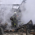 
              Ukrainian firefighters work at a scene of a destroyed building after shelling in Odesa, Ukraine, Sunday, April 3, 2022. (AP Photo/Petros Giannakouris)
            