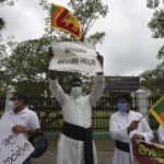 
              Sri Lankans Catholic priests protest in Colombo, Sri Lanka, Saturday, April 9, 2022. Christian clergy marched into the capital to observe a day of protest on Saturday calling on the country's president to resign amid worst economic crisis in history. (AP Photo/Eranga Jayawardena)
            