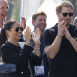
              Prince Harry and Meghan Markle, Duke and Duchess of Sussex, attend the Land Rover Driving Challenge at the Invictus Games venue in The Hague, Netherlands, Saturday, April 16, 2022. The week-long games for active servicemen and veterans who are ill, injured or wounded opens Saturday in this Dutch city that calls itself the global center of peace and justice. (AP Photo/Peter Dejong)
            