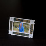 
              A framed photo of Taya Bruell is photographed in Santa Barbara, Calif., Wednesday, March 9, 2022. Taya killed herself when she was 14. Taya was a bright, precocious student who had started struggling with mental health issues at about 11, according to her father. At the time, the family lived in Boulder, Colorado where Taya was hospitalized at one point for psychiatric care but kept up the trappings of a model student: She got straight As, was co-leader of her high school writing club and in her spare time taught senior citizens to use computers. (AP Photo/Jae C. Hong)
            