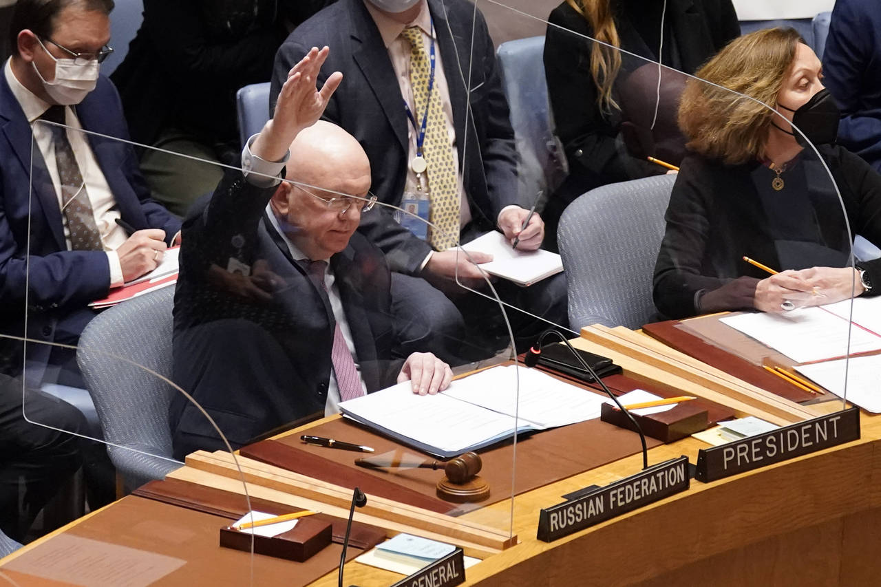 FILE - Russia's U.N. Ambassador Russia Vasily Nebenzya casts the lone dissenting vote in the United...