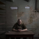 
              Roman Dudin, head of the Ukrainian Security Service in Kharkiv, poses for a photo inside a basement in Kharkiv, Ukraine, Wednesday, April 13, 2022. Ukrainian authorities are cracking down on anyone suspected of aiding Russian troops under laws enacted by Ukraine’s parliament and signed by President Volodymyr Zelenskyy after the Feb. 24 invasion. Offenders face up to 15 years in prison for acts of collaborating with the invaders or showing public support for them. (AP Photo/Felipe Dana)
            