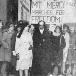 
              This 1965 photo provided by the Pittsburgh Catholic shows Patricia Grey, center, a nun in the Sisters of Mercy and a founder of the National Black Sisters' Conference, at a sympathy march for Selma, Ala., held in Pittsburgh. (Pittsburgh Catholic via AP)
            