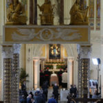 
              Pope Francis, center, prays in front of the Virgina Mary of Ta'Pinu together with, from left, Malta's Archbishop Charles Jude Scicluna, Secretary General of the Synod of Bishops Cardinal Mario Grech, and Gozo's Bishop Antonio Teuma, right, at the Ta' Pinu national sanctuary in Gharb on the Maltese island of Gozo, Saturday, April 2, 2022. Pope Francis headed to the Mediterranean island nation of Malta on Saturday for a pandemic-delayed weekend visit, aiming to draw attention to Europe's migration challenge that has only become more stark with Russia's invasion of Ukraine. (AP Photo/Andrew Medichini)
            